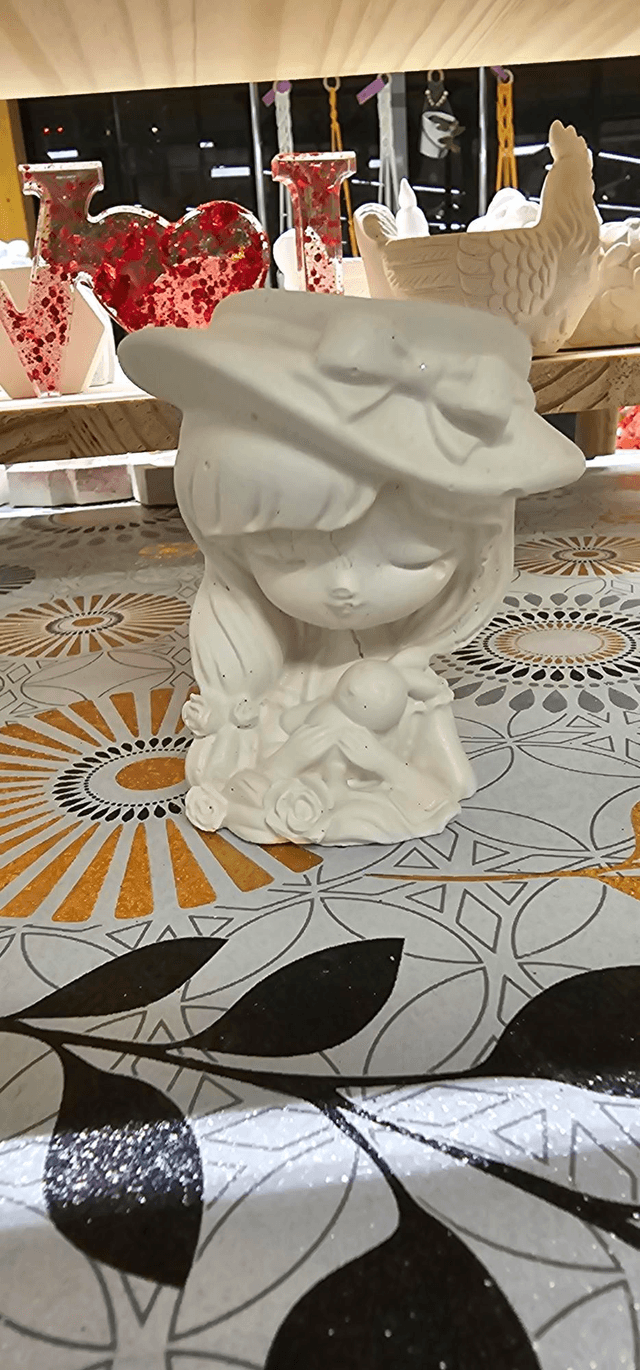 Jeune fille au chapeau